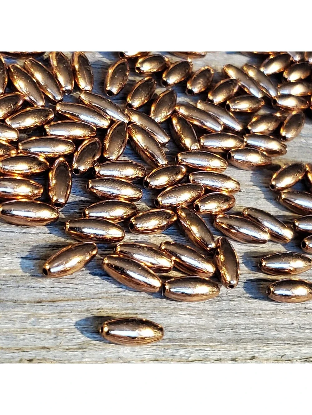 Bulk Pack of 50 Solid India Shiny Copper 9x4mm Smooth Oval Spacer Beads